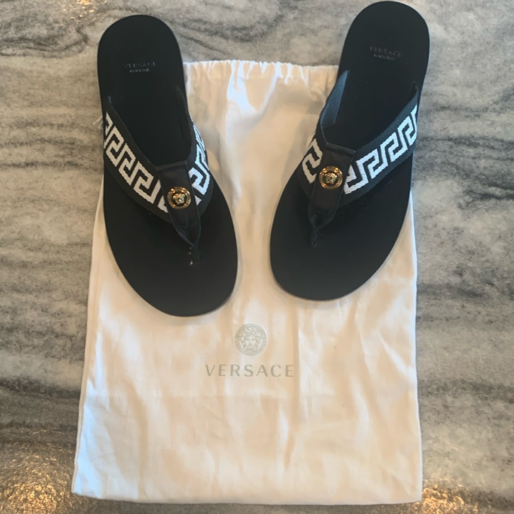 Versace Versace Versace with bag 
Never worn outside only tried on inside
